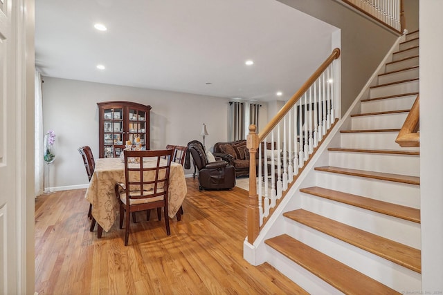 dining area with light hardwood / wood-style flooring