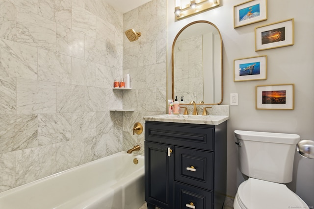 full bathroom with vanity, tiled shower / bath combo, and toilet