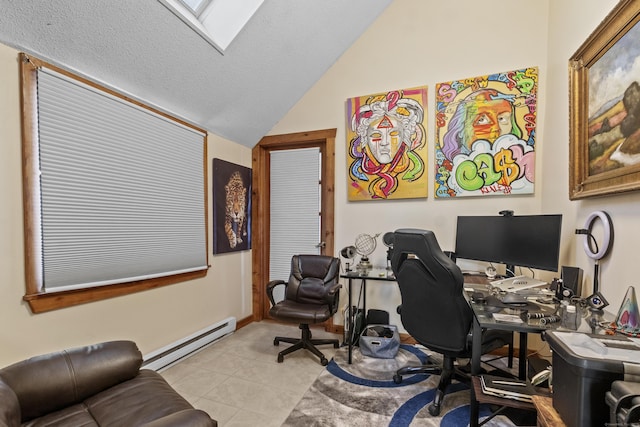 tiled home office featuring vaulted ceiling with skylight, a textured ceiling, and a baseboard heating unit