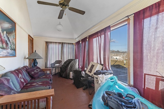 sunroom / solarium with ceiling fan and vaulted ceiling