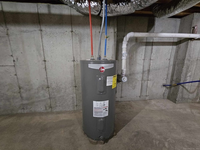 utility room with electric water heater