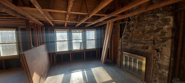 misc room featuring a stone fireplace