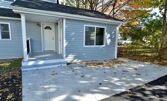 property entrance with a patio