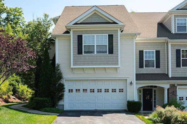 view of front of property featuring a garage