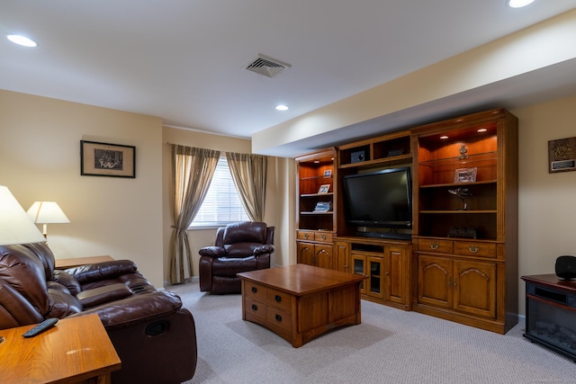 living room featuring light colored carpet