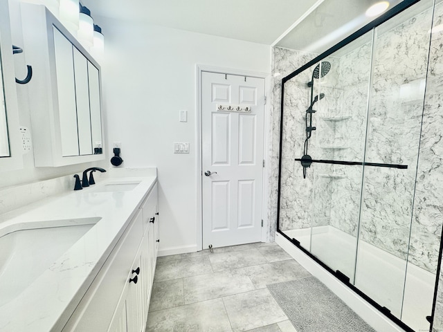 bathroom with vanity and an enclosed shower