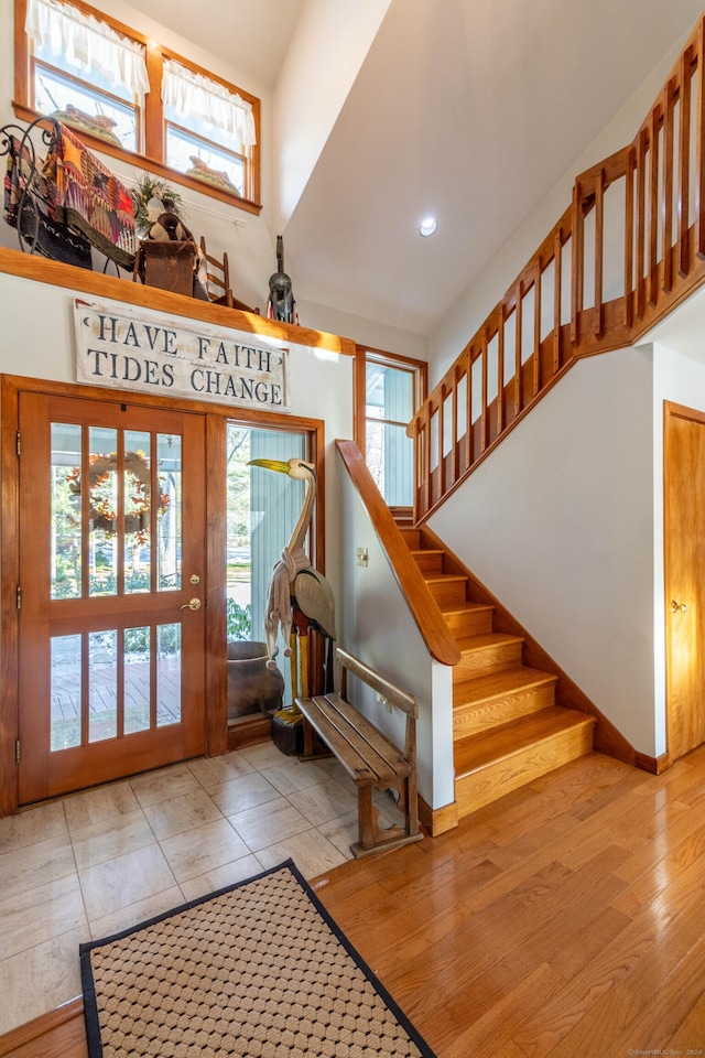 foyer entrance featuring a healthy amount of sunlight and light hardwood / wood-style floors