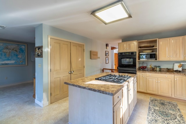 kitchen featuring light stone countertops, stainless steel appliances, light colored carpet, light brown cabinetry, and a kitchen island