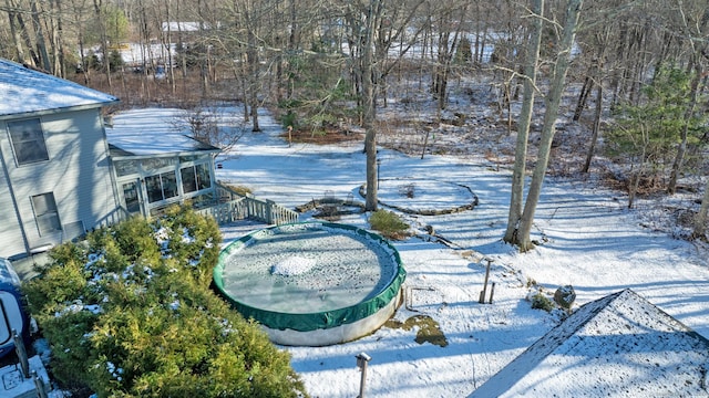 view of yard layered in snow