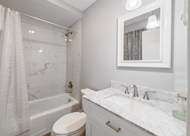 full bathroom featuring shower / bath combination with curtain, vanity, and toilet