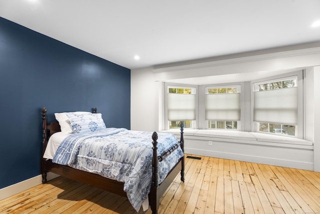 bedroom featuring light wood-type flooring