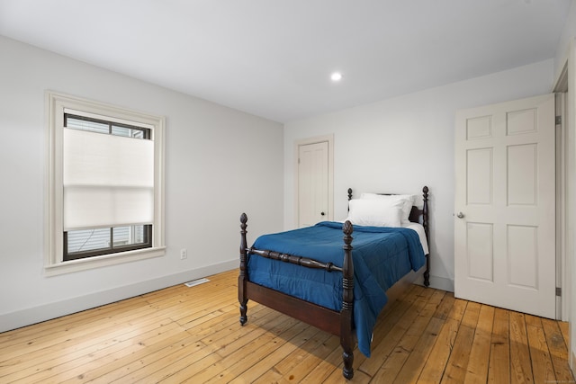 bedroom featuring light hardwood / wood-style floors