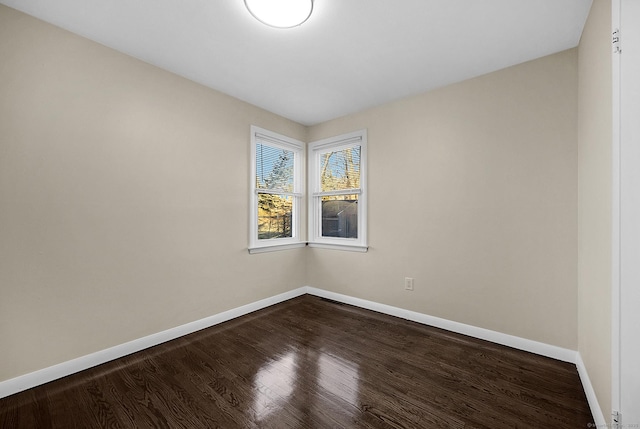 unfurnished room featuring hardwood / wood-style flooring