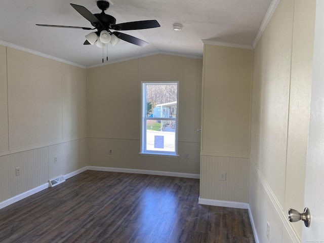 108-16 Clark Rd, Naugatuck, CT 06770 - empty room featuring dark wood-style flooring, a ceiling fan, a wainscoted wall, ornamental molding, and vaulted ceiling