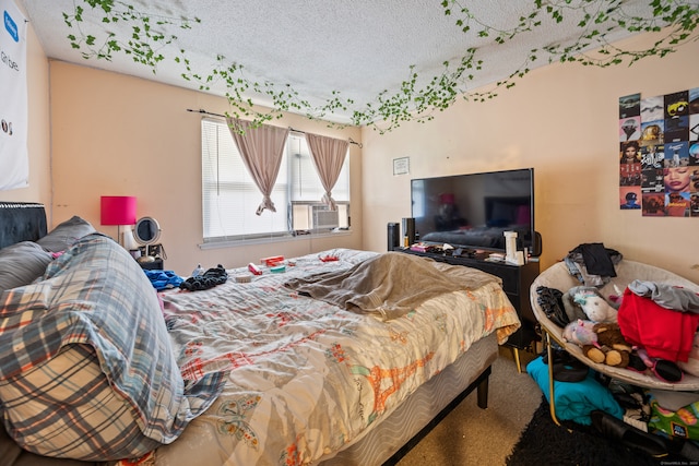 carpeted bedroom with cooling unit and a textured ceiling