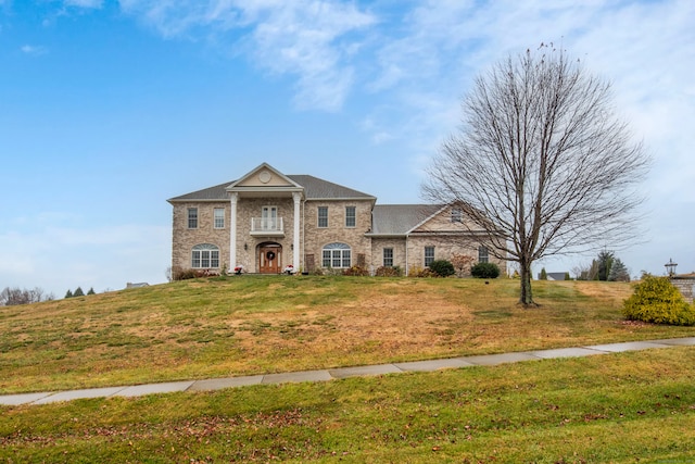 view of front of house with a front yard