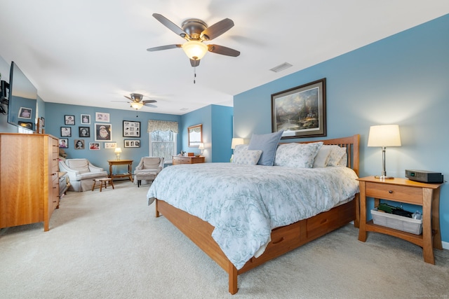 carpeted bedroom with ceiling fan