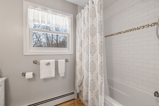 bathroom with vanity, a baseboard radiator, and shower / bath combo