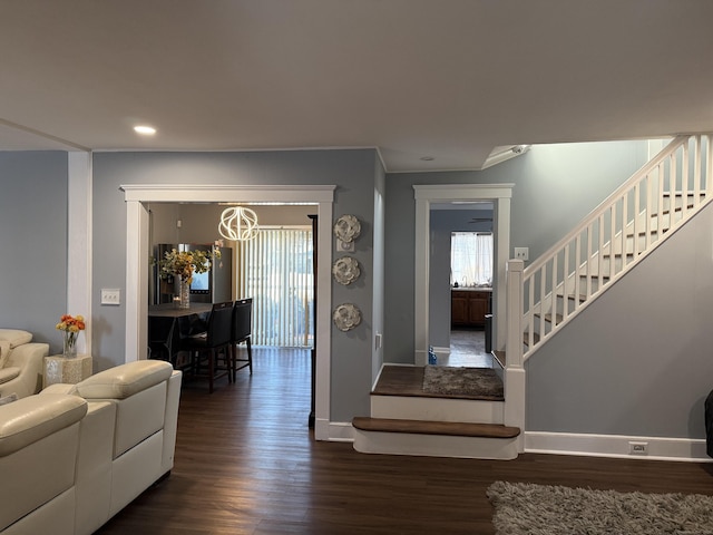 interior space featuring crown molding and hardwood / wood-style flooring