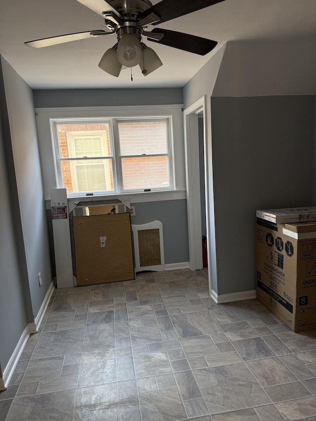 kitchen featuring ceiling fan