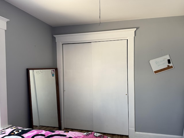 unfurnished bedroom with a closet