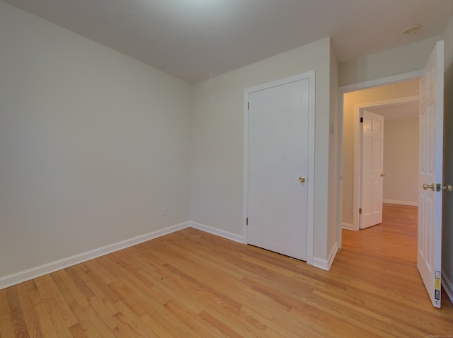 unfurnished room featuring light hardwood / wood-style flooring