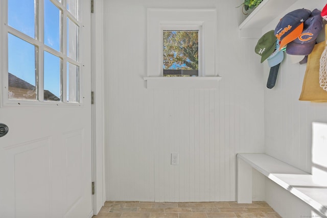 interior space featuring wood walls