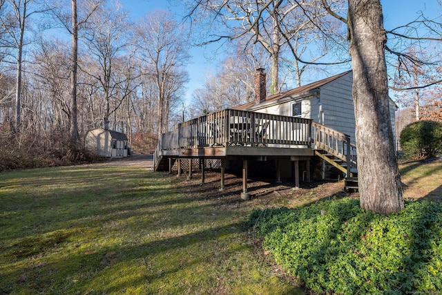 back of property featuring a yard and a deck