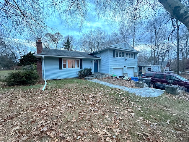 view of front of home with a garage