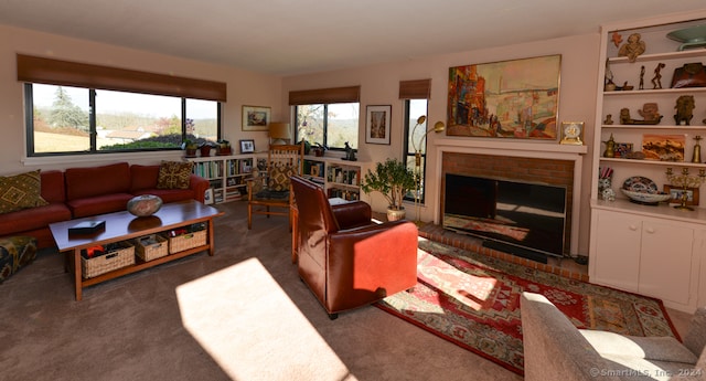 carpeted living room with a fireplace