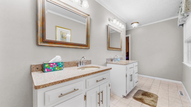 bathroom featuring tile patterned floors, vanity, a textured ceiling, and ornamental molding