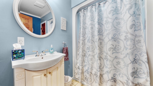 bathroom featuring tile patterned floors, vanity, curtained shower, and crown molding