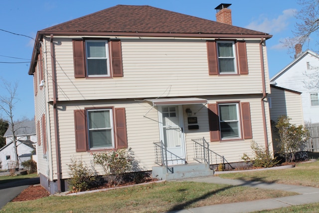 view of front of house with a front yard