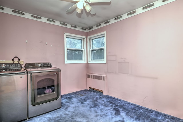 laundry area featuring separate washer and dryer, dark carpet, radiator, and ceiling fan