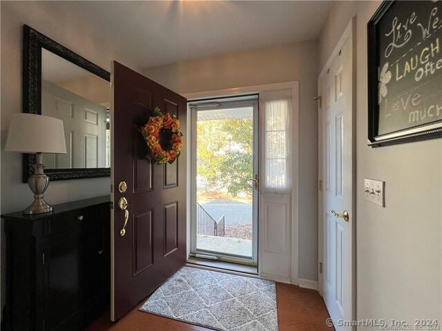 foyer entrance featuring light hardwood / wood-style floors