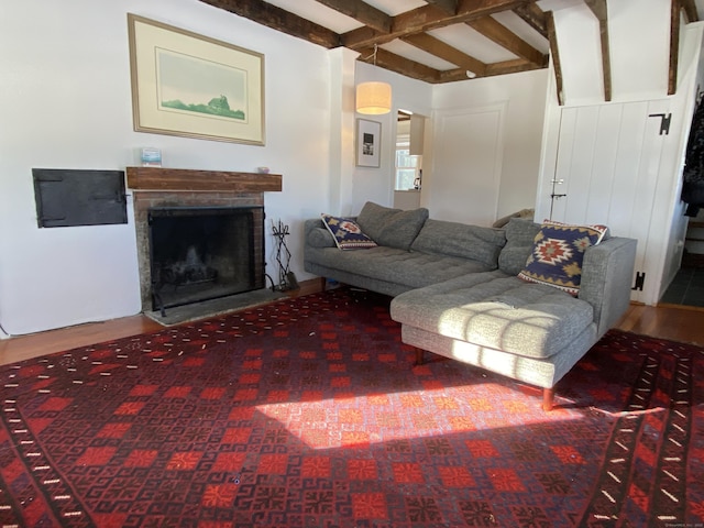 living room with beamed ceiling