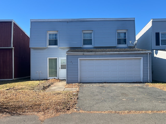 view of front property with a garage