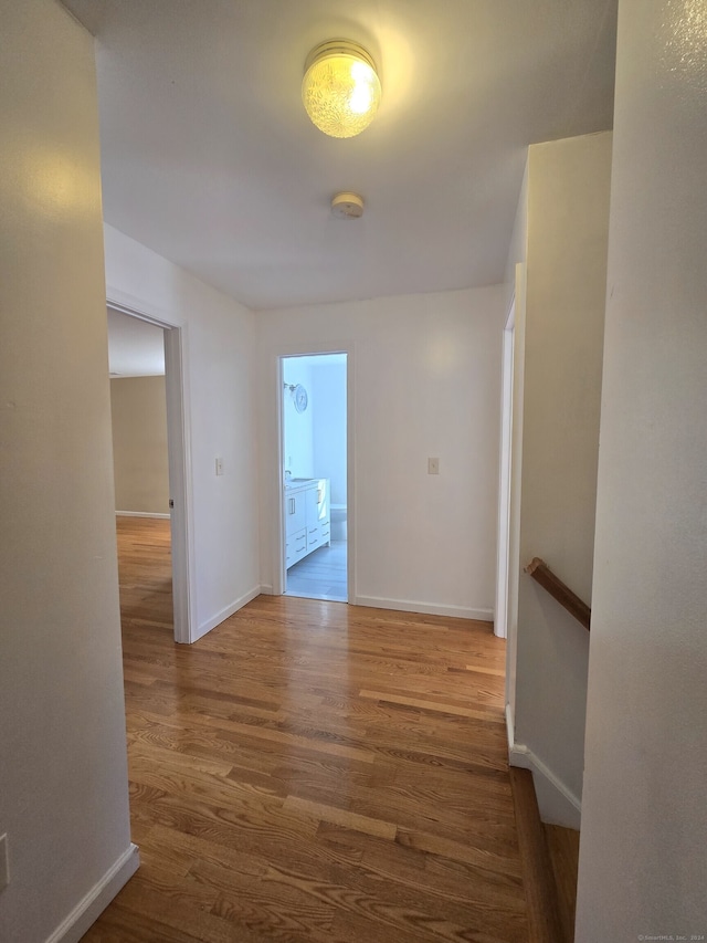 hallway featuring hardwood / wood-style floors