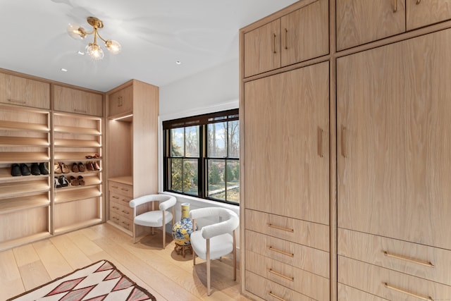 living area with light hardwood / wood-style floors