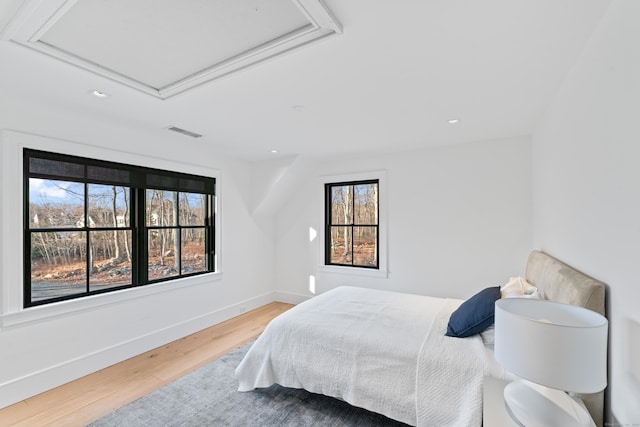 bedroom featuring hardwood / wood-style floors