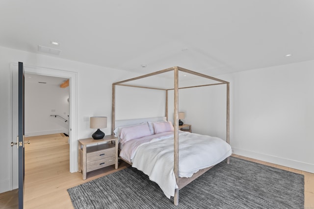 bedroom featuring wood-type flooring