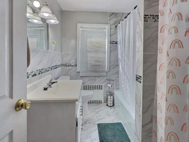 full bathroom featuring vanity, radiator, toilet, shower / bathtub combination with curtain, and tile walls