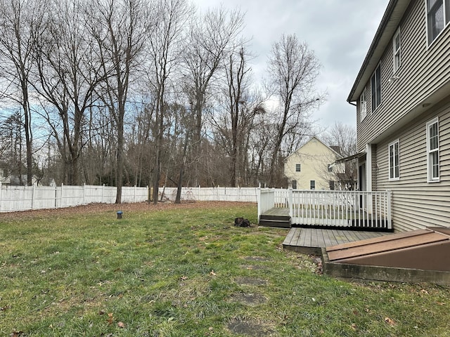 view of yard featuring a wooden deck