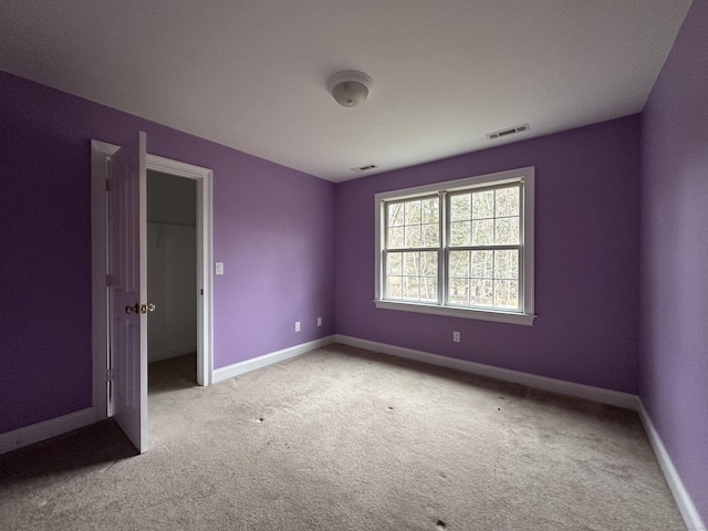 unfurnished bedroom with carpet