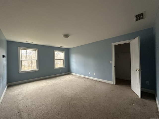 view of carpeted spare room