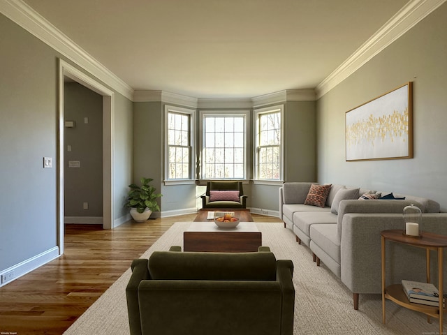 living room with wood-type flooring and ornamental molding