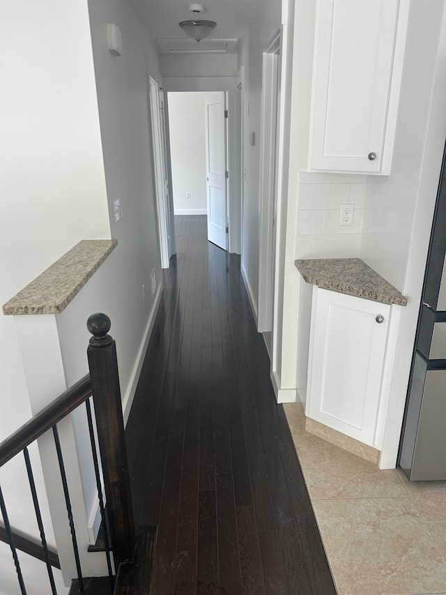 hallway with light wood-type flooring