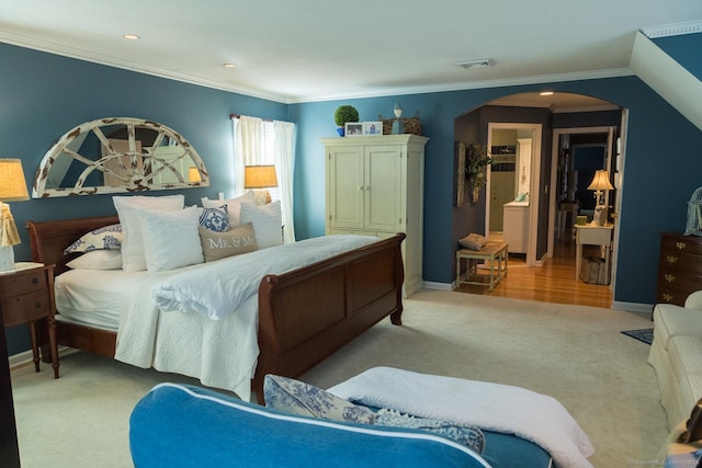 bedroom featuring light carpet and ornamental molding