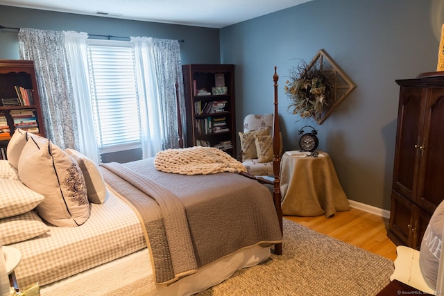 bedroom featuring light hardwood / wood-style flooring