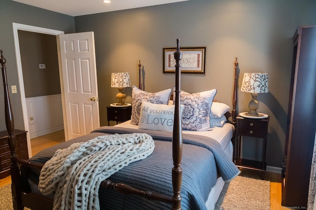 bedroom with hardwood / wood-style flooring